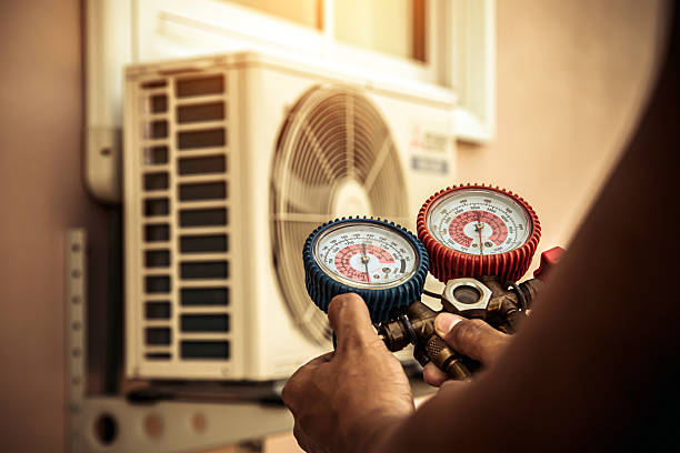 Professional Air Conditioning Service technician working in Point Lookout, NY